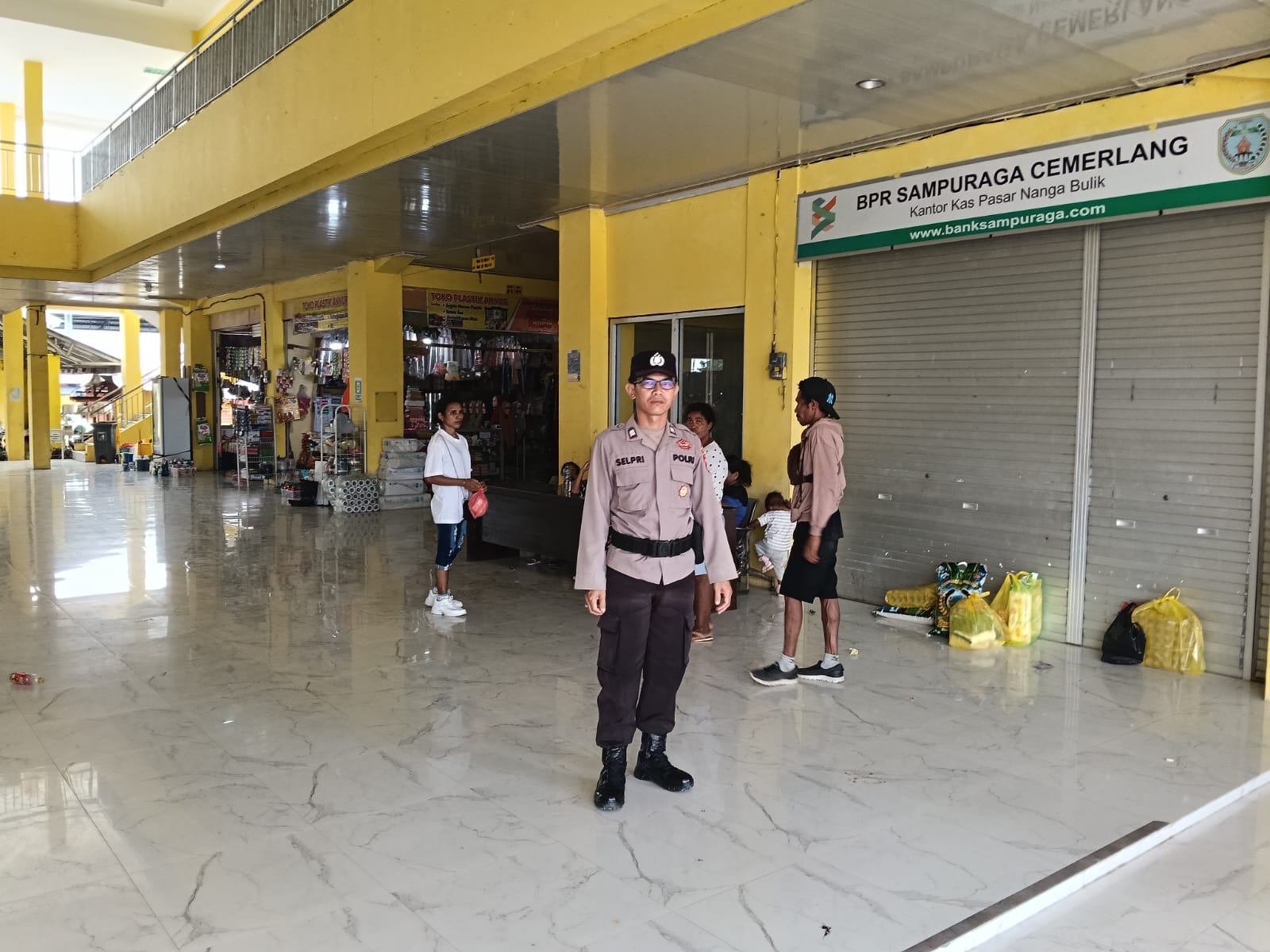 Piket Polsek laksanakan Patroli di Pasar di Wilkum Polsek Bulik