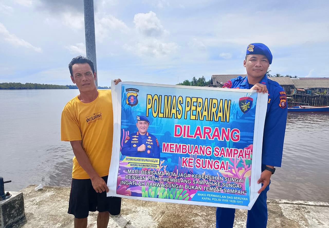 Personel Ditpolairud Polda Kalteng Dorong Kesadaran Masyarakat Seruyan Jaga Kebersihan Sungai dari Sampah